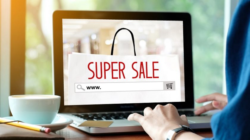 Woman hands typing laptop computer with www. on search bar over online super sale banner background, Holiday shopping online, business and technology