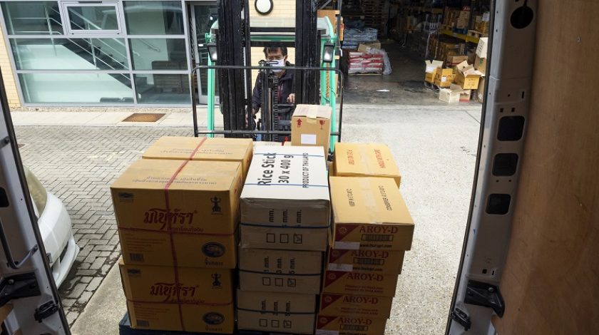 Guildfrod. UK. April the 30th, 2020. Close-up of Food Supplier Warehouse loading goods during the Lockdown. This place is specialized in products from Thailand.  Takeaway Thai food is very popular in the UK.
